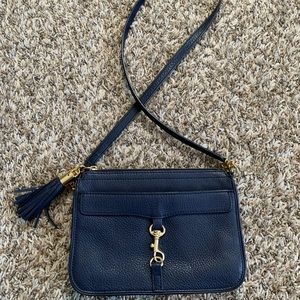 Navy crossbody bag with gold hardware and tassel
